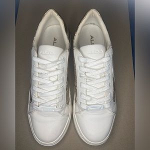Aldo white and tan sneakers. Size 6W. Slightly worn.